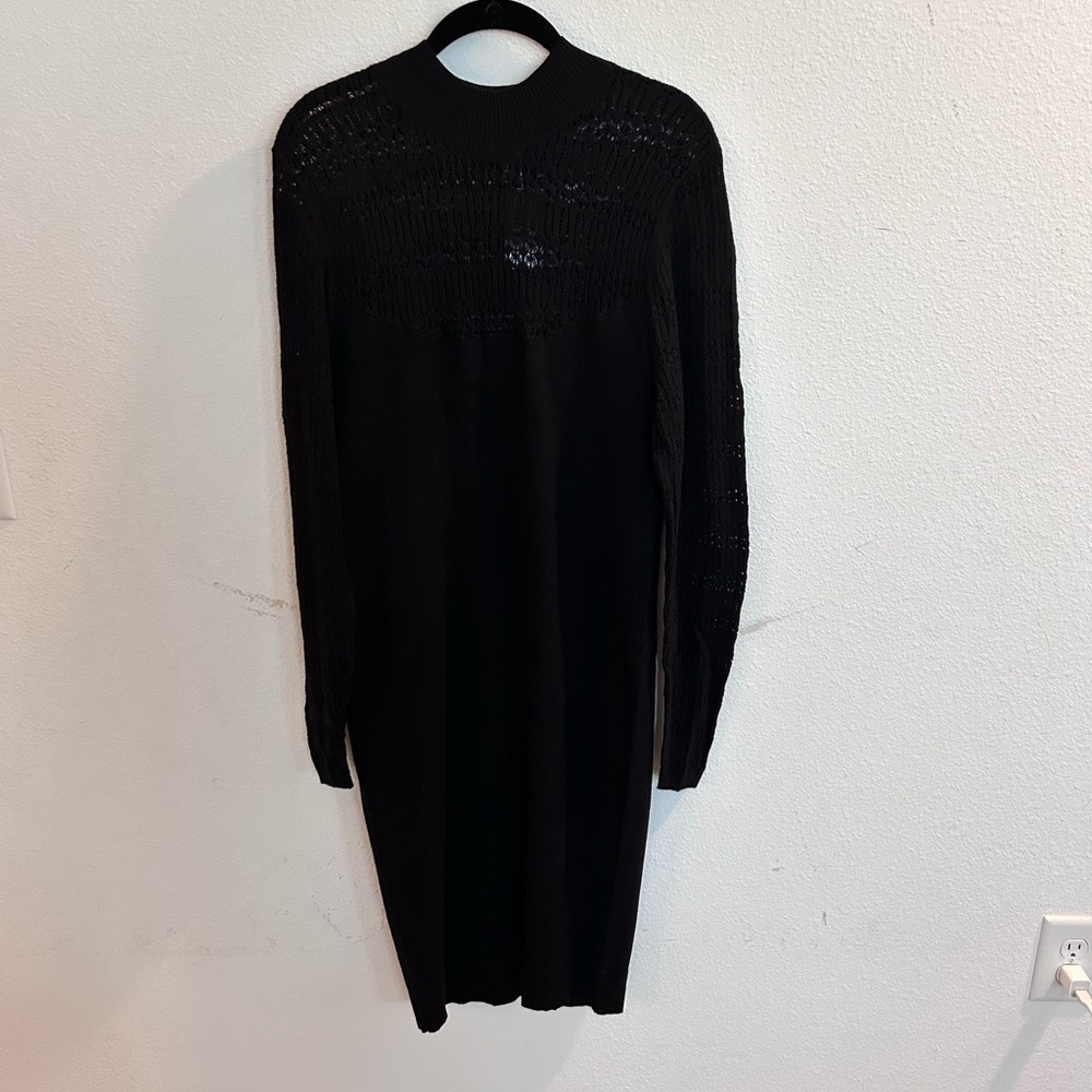 Torrid Women’s Black Sweater Dress

Size 2 (18-20)
NWT